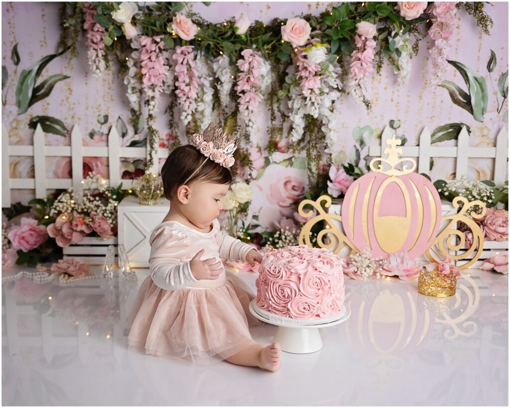 A princess fairytale cake smash designed by best connecticut Fist Birthday photographer serving all of Westchester County NY