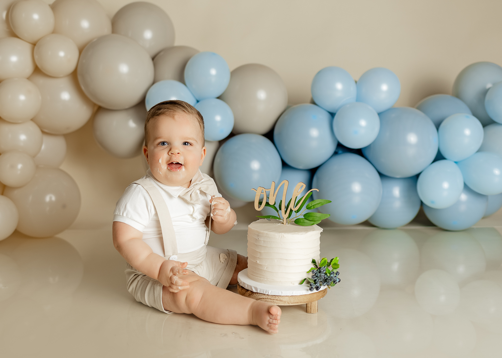 simple balloon garland cake smash boy first birthday Connecticut and Westchester County NY Best Cake Smash Photographer and First Birthday Photoshoot